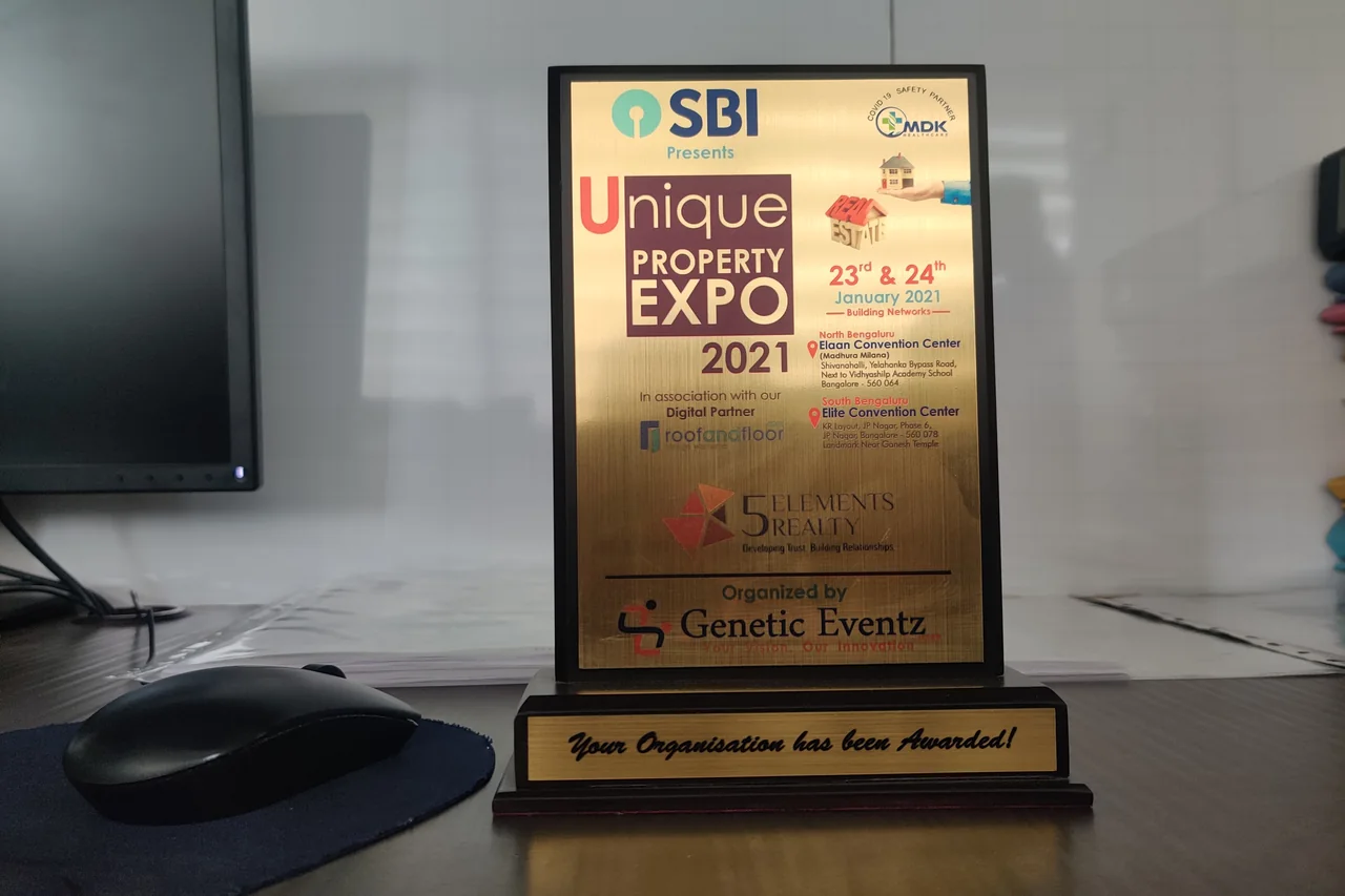 Unique Property Expo 2021 plaque presented by SBI