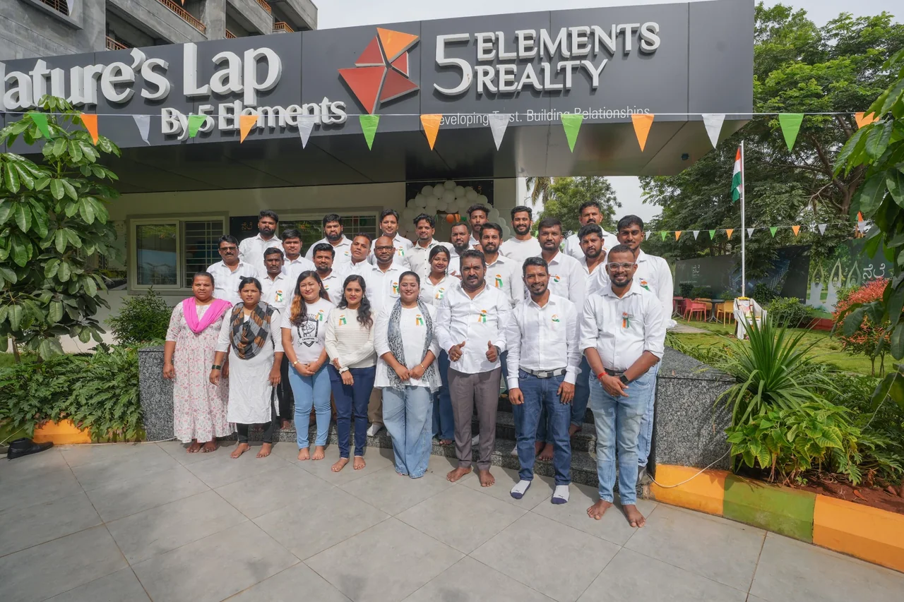 Nature’s Lap · A group photograph outside the project office.